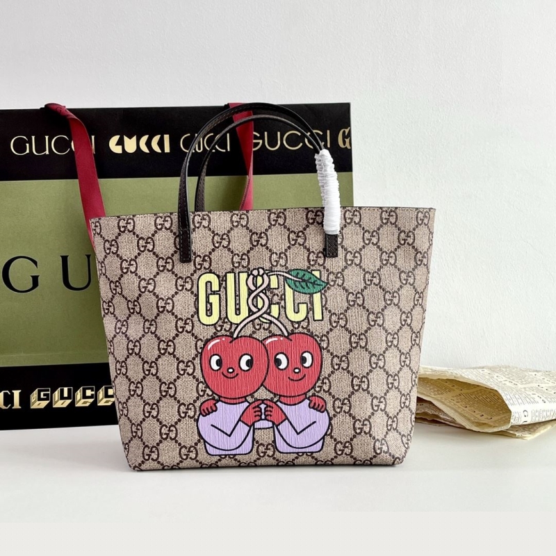G*u*i shopping bags